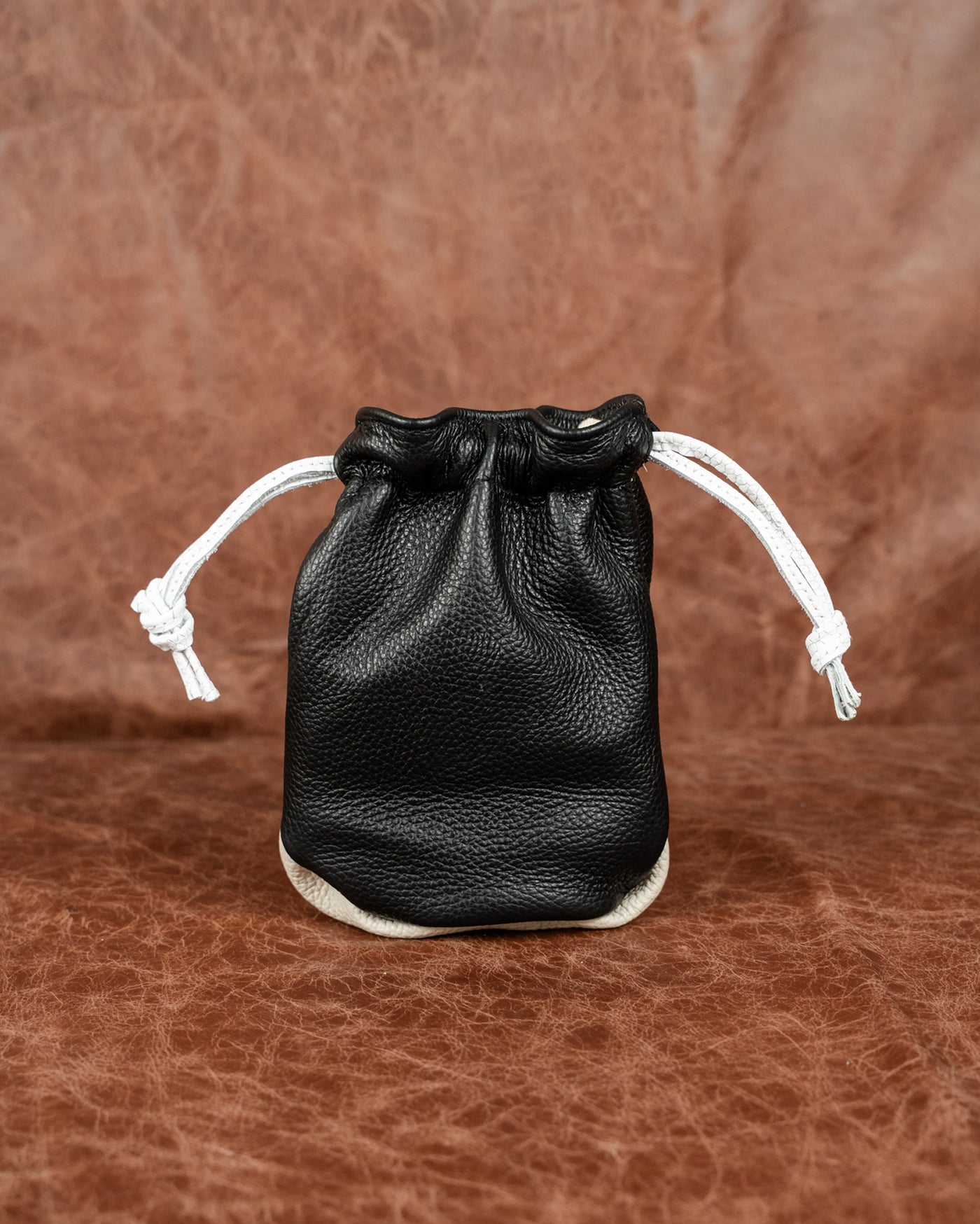Pitch Black + White Boa + Sand