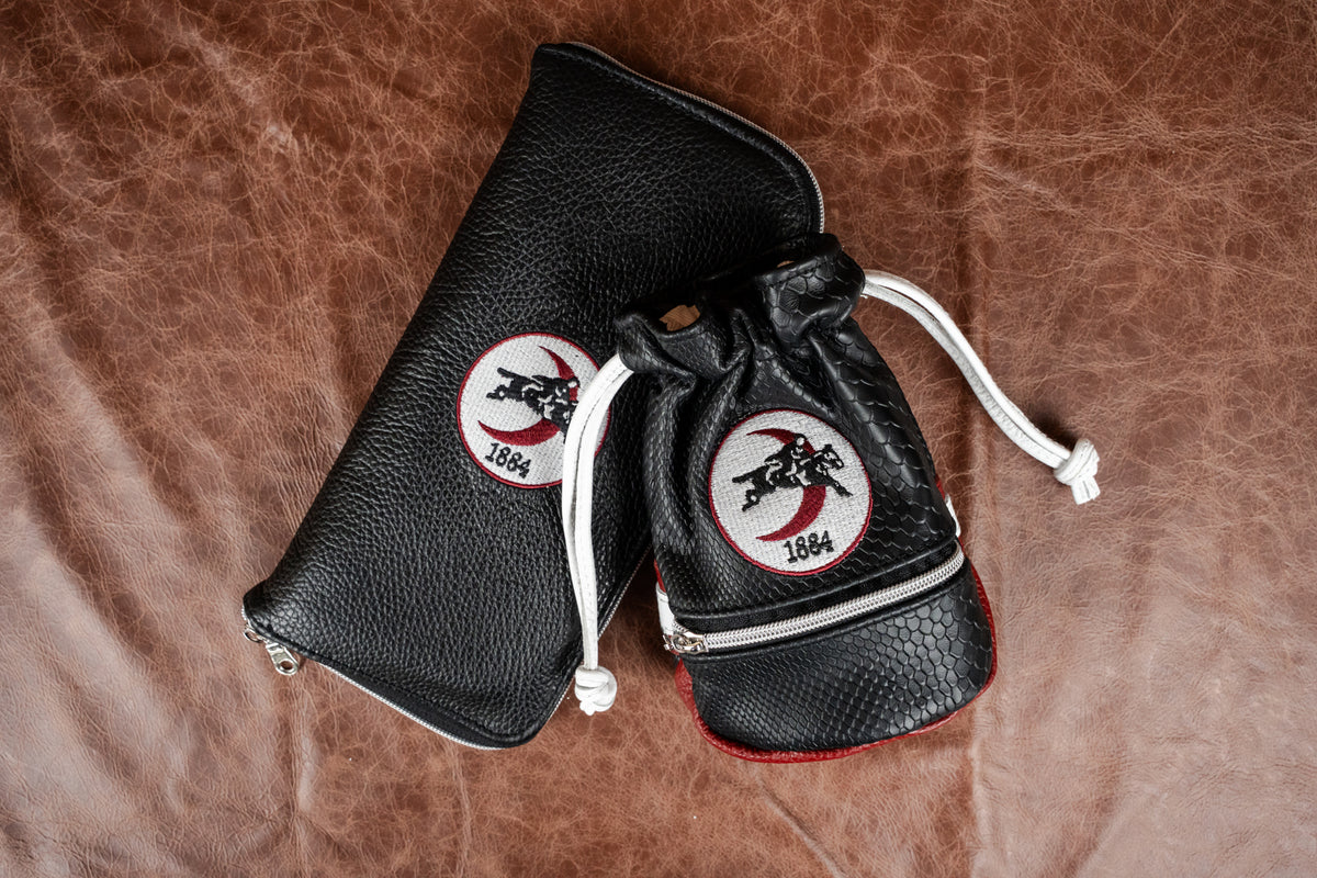Huntington Crescent glove guard and valuables pouch in black leather and crimson accents